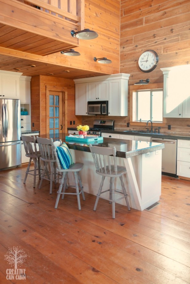 Log Home Kitchen | White Kitchen | Painted Bar Stools | Pops of Color | CreativeCainCabin.com