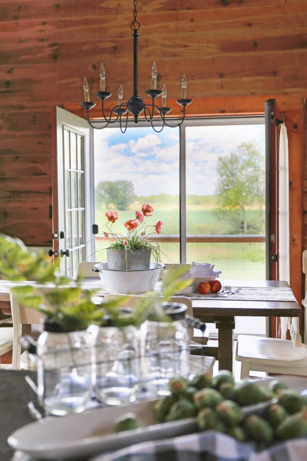 French Doors Open in the Dining Room of a Log Home