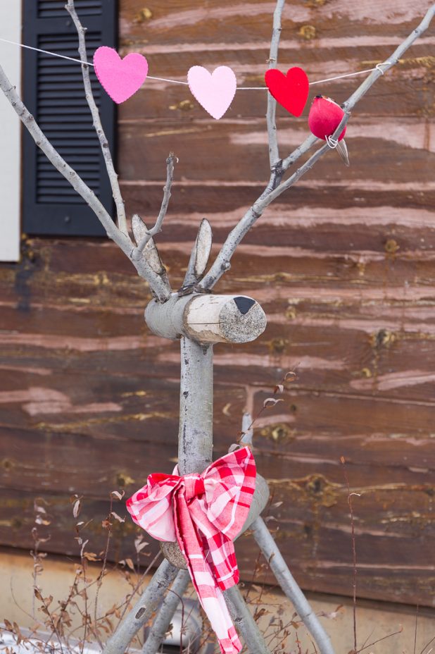 Rustic Wooden Deer Decorated For Valentine's Day