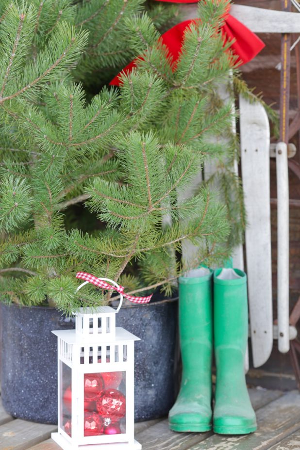 Rustic Log Home Christmas Porch, Fresh Cut Pines, Vintage Red Wagon, Grapevine Wreath, Pine Clippings, Boots, and Galvanized Buckets, How To Preserve Pine Branches