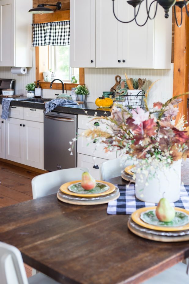 Rustic Farmhouse Charm Can Be Found In This Log Cabin. Fall Decorating Using Natural Elements and Keeping It Simple With Pumpkins